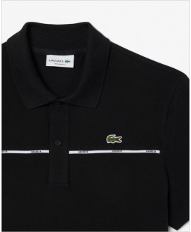Polo negro L.12.12 regular ribete blanco logotipo LACOSTE